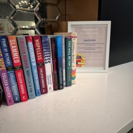 Live at the 450 Books on a desk