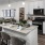 Open kitchen and living room with plenty of natural light.