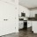 Open kitchen and living room with plenty of natural light.