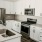 Open kitchen and living room with plenty of natural light.