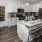 Open kitchen and living room with plenty of natural light.